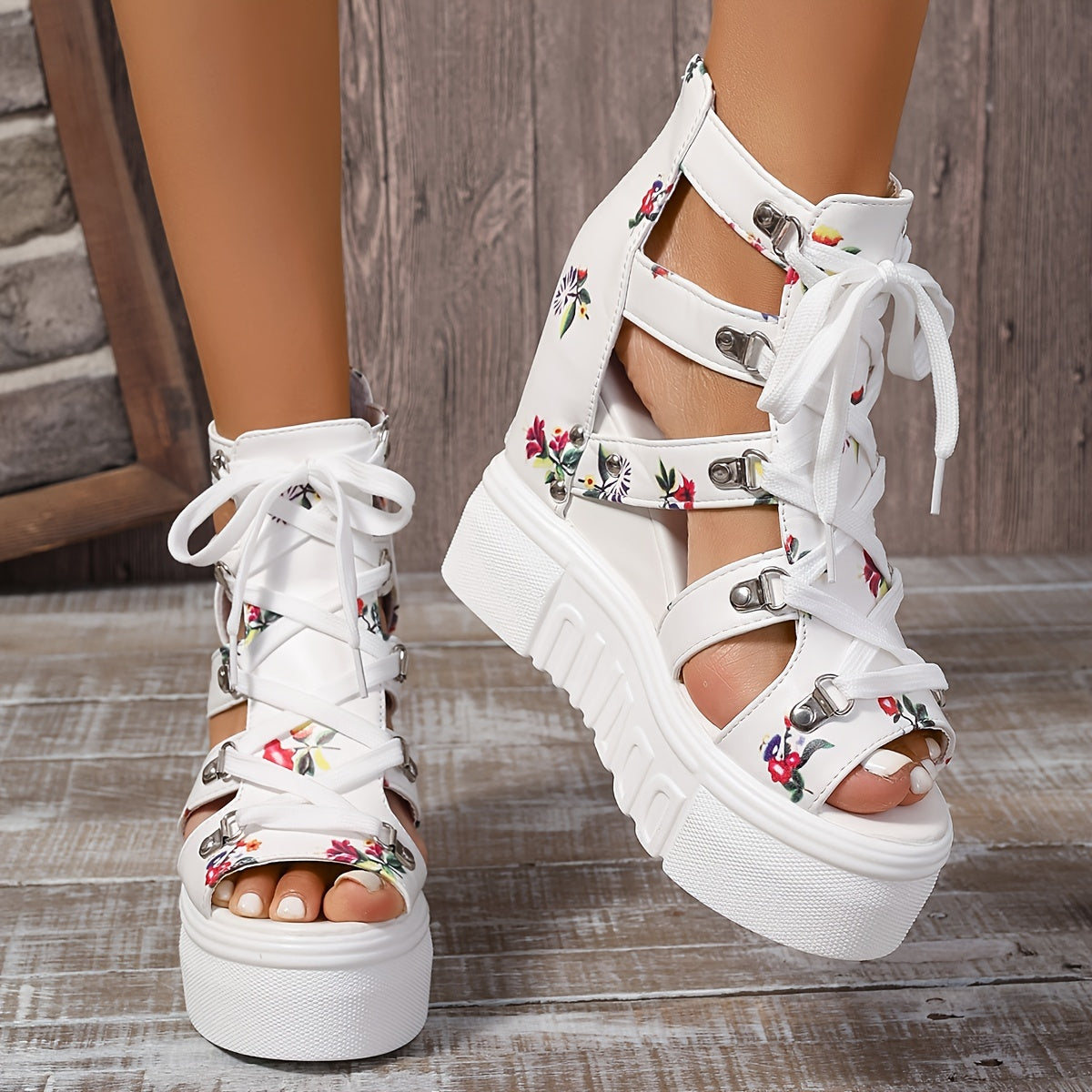 SPECIFICATIONS Closure: Zipper Heel Hight: High Heel Heel Type: Platform Heel Inner Material: EVA Insole Material: EVA Item ID: AE166916 Operation Instruction: Other Pattern: Flowers Sole Material: PU Toe Style: Open Toe Upper Material: EVA